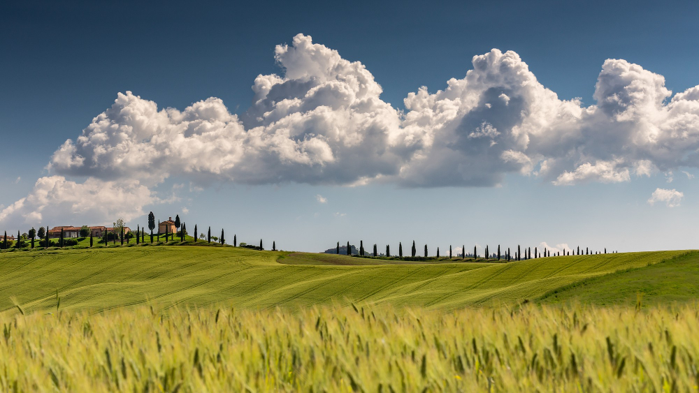 landscape shot val d orcia tuscany italy with cloudy sunny blue sky